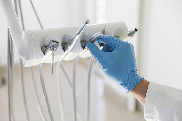 Professional Tooth Extraction technician working in Columbia Falls, MT